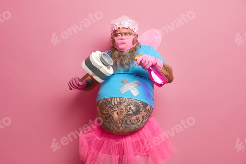 Preview: Cleaning Service, Household, Housekeeping Concept. Shocked Funny Plump Man Dressed In Fairy Outfit