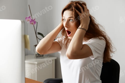 Preview: Shocked Female Office Worker Having Unsaved Data Problem On Laptop While Working In The Office