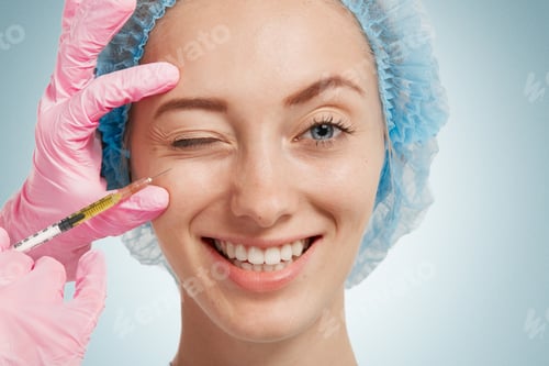 Preview: Reduction Of Wrinkles, Injection, Nasal Labial Folds. Portrait Of A White Woman During Surgery