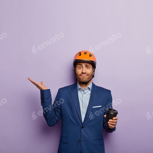 Preview: Doubtful Engineering Man Has Coffee Break, Holds Takeaway Cup, Wears Orange Safety Helmet And