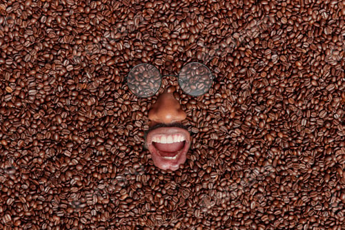 Preview: Happy Dark Skinned Male Model Fully Covered With Brown Coffee Beans Keeps Mouth Opened Wears