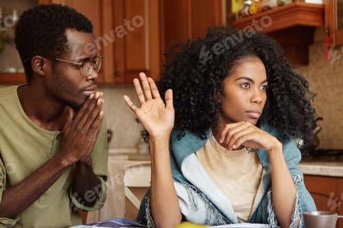 Preview: People, Relationships Problems And Divorce. Repentant Worried Dark-Skinned Male Keeping Hands