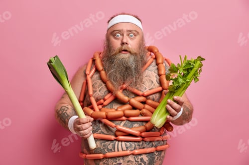 Preview: Photo Of Obese Man With Thick Beard Eats Useful Vegetables, Has Excess Weight, Tries To Refuse