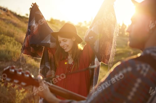 Preview: Carefree Woman In Black Hat, Red Blouse And Scarf On Shoulders Closing Her Eyes And Raising Hands