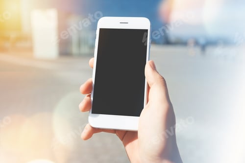 Preview: Technology And Communication Concept. Cropped Shot Of A Man'S Hand Holding Mobile Phone Tries To