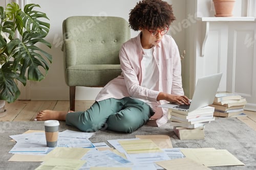 Preview: Serious Black Young Female Administrative Manager Thinks Over Successful Strategy Of