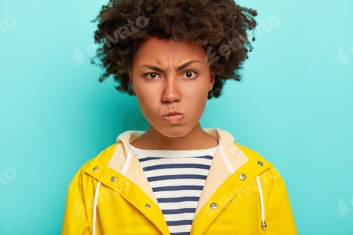 Preview: Close Up Shot Of Displeased Young Woman With Afro Hairstyle, Frowns Face With Anger, Being Annoyed