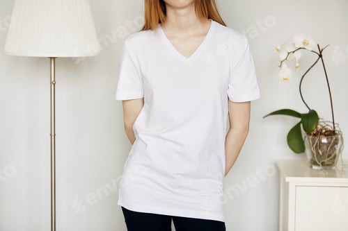 Preview: Close Up Portrait Of Young Woman Posing Against Home Interior Background With A Floor Lamp And