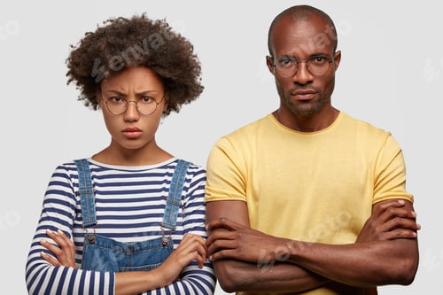 Preview: Photo Of Displeased Sullen African American Female Student And Her Male Companion, Stand Crossed