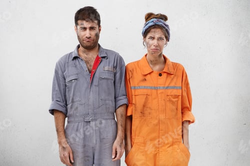 Preview: People, Manual Work And Tiredness Concept. Displeased Female And Male Technicians, Having Dirty
