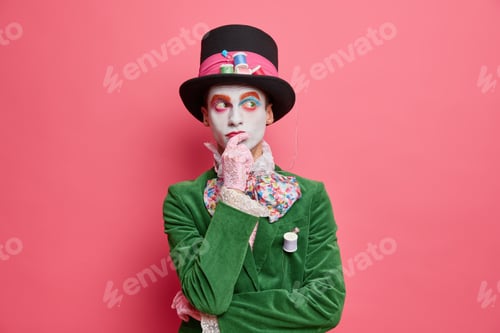 Preview: Thoughtful Holiday Performer Thinks How To Entertain People On Party Dressed In Hatter Costume