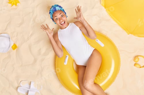 Preview: Outdoor Shot Of Emotional Cheerful Beautiful Afro American Woman Raises Hands Exclaims Joyfully