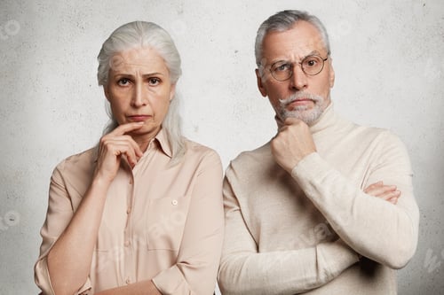 Preview: Two Female And Male Pensioners Keep Hands On Chin, Look Thoughtfully, Watch News, Spend Time In