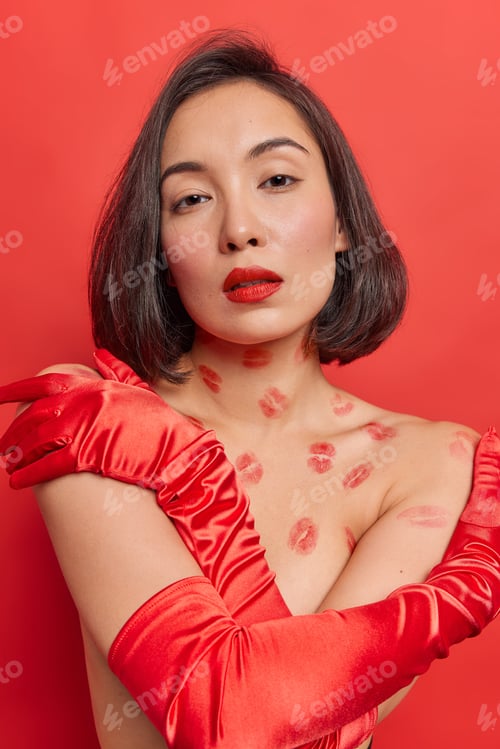 Preview: Vertical Shot Of Gorgeous Young Asian Woman With Dark Hair Embraces Herself Poses Half Naked Has