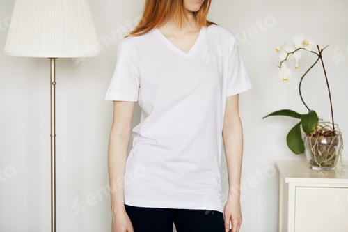 Preview: Cropped View Of Beautiful Teenage Girl With Red Hair And Freckles Looking Away While Posing Against