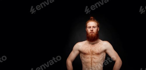 Preview: Portrait Of Muscular Bearded Man Isolated On Black Background With Lots Of Copy Space