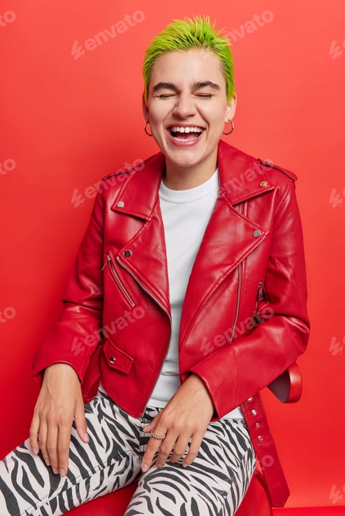 Preview: Overjoyed Hipster Girl With Short Dyed Green Hair Laughs Out Has Fun Extraordinary Appearance