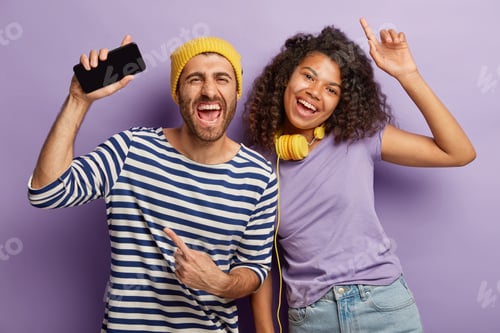 Preview: Happy Friends Listening to Music and Using Phone