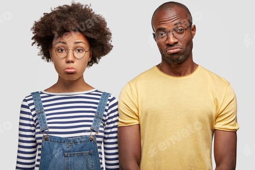 Preview: Upset African Aerican Female And His Boyfriend Have Unhappy Expressions, Curve Lips In Discontent
