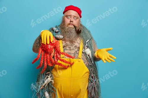 Preview: Hesitant Sailor Shrugs Shoulders, Holds Octopus In Hand, Wears Rubber Gloves, Has Sea Adventure
