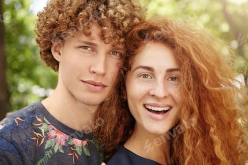 Preview: Summer Lifestyle Portrait Of Beautiful Happy Young Caucasian Couple With Curly Red Hair Relaxing