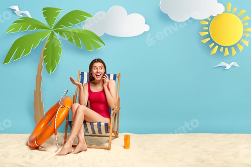 Preview: Happy Excited Woman In Red Swimwear, Relaxes On Deckchair At Sandy Beach Sea Coast, Talks On