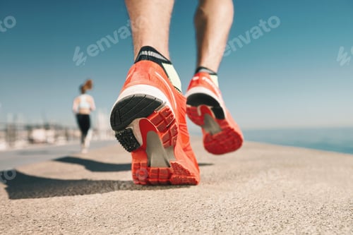 Preview: Running Sport. Man Runner Legs And Shoes In Action On Road Outdoors At Sunset. Male Athlete Model.
