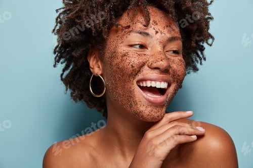 Preview: Natural Smiling Lady With Happy Expression, Uses Coffee Scrub Mask, Cares Of Beauty, Wants To Look