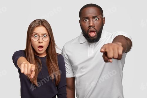 Preview: Scared Frightened Emotive Mixed Race Brother And Sister Keep Jaws Dropped, Indicate With Both Index