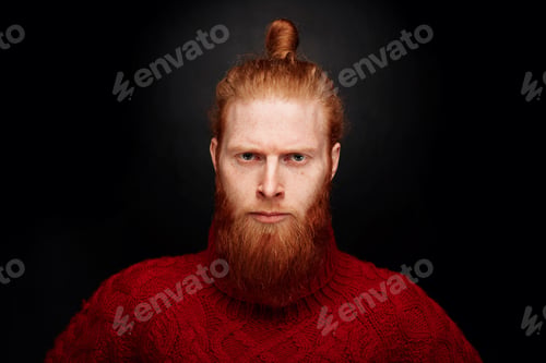 Preview: Perfect Beard. Close-Up Portrait Of Young Brutal And Serious Bearded Man Standing Against Black