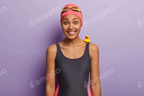 Preview: Positive Good Looking Female With Healthy Dark Skin, Smiles Broadly, Shows Perfect Teeth, Rejoices