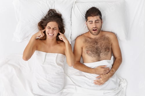 Preview: Exhausted Woman Can`T Stand Boyfriend`S Loud Sleep, Plugg Ears With Anger, Suffering From Headache
