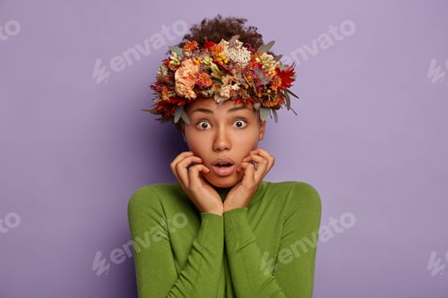 Preview: Frightened Nervous Woman With Dark Skin, Keeps Hands Near Opened Mouth, Looks With Shock At Camera