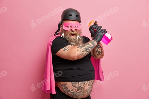 Preview: Happy Positive Adult Man Has Thick Beard With Clothespins Holds Detergent Has Tricky Plan To Clean