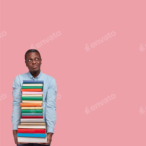 Preview: Pensive Dark Skinned College Student Looks With Indecisive Hesitant Thoughtful Expression Upwards