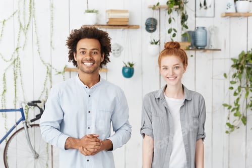 Preview: Indoor Shot Of Happy Confident Senior Dark-Skinned Engineer With Afro Hairstyle Standing With Hands