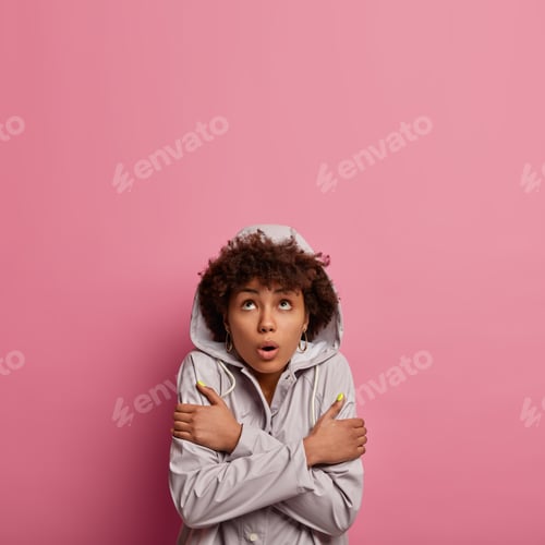 Preview: Turn On Heater, Its Cold. Surprised Freezing Woman Trembles During Windy Rainy Weather, Hugs