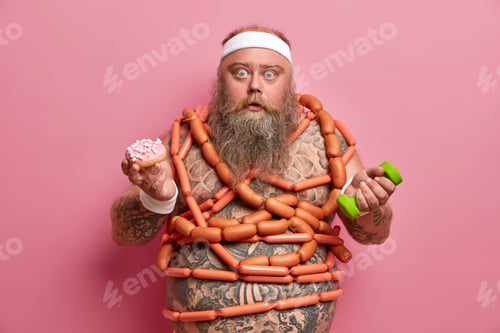 Preview: Stupefied Stout Bearded Man Poses With Junk Food And Dumbbell, Needs Proper Nutrition And Sport