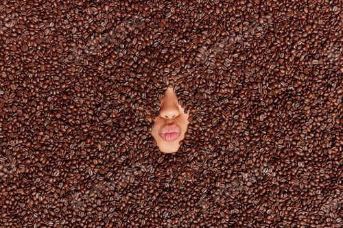 Preview: Creative Shot Of Womans Face Covered With Fragrant Coffee Beans Keeps Lips Folded Prepares Aromatic