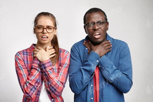 Preview: Human Emotions, Feelings, Reaction And Attitude. Young Interracial Couple Holding Hands On Throat
