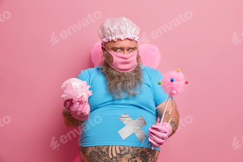 Preview: Shocked Man Stares At Magic Wand, Doesnt Know What To Do With It, Holds Sponge, Wears Protective