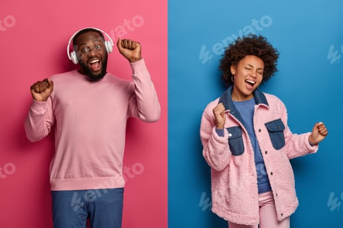 Preview: People, Music And Leisure Concept. Happy African American Couple Dances Carefree, Move Actively And