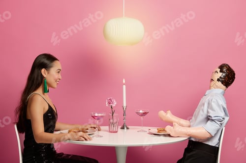 Preview: Positive Asian Woman Enjoys Romantic Dinner Date With Inflatable Man, Looks At Her Lover, Spend