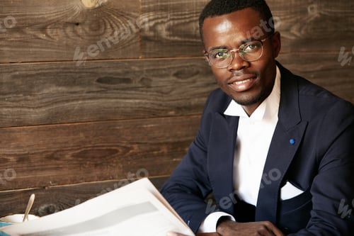 Preview: Lifestyle And People Concept. Headshot Of Young African Businessman In Formal Suit And Glasses