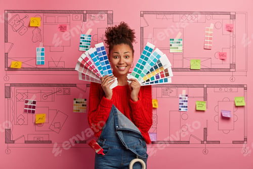 Preview: Interior Renovation And Decor Concept. Pretty Smiling Curly Haired Woman Wants To Change Color In