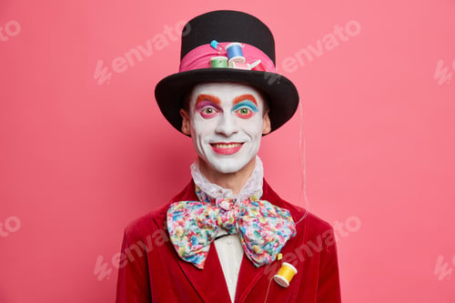 Preview: Happy Male Hatter With Colorful Makeup Dresses For Halloween Party Has Image Of Fictional Character