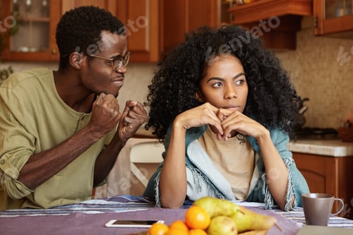 Preview: Black Full Of Anger Husband Clenching Fists Mad At His Indifferent Wife, Desiring For Explanations