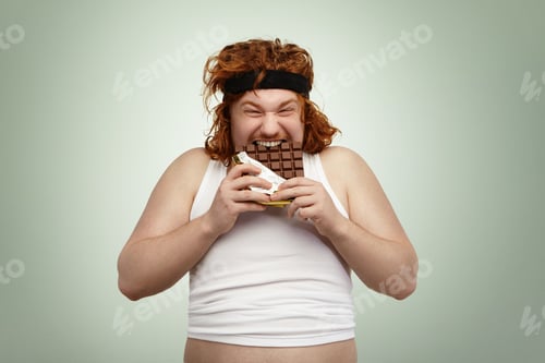Preview: Crazy And Hungry Overweight Young Redhead European Male With Good Appetite Wearing Black Sports Bra