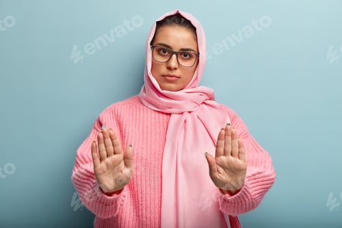 Preview: No, I Deny It! Serious Muslim Lady Stretches Palms Forward At Camera, Demonstrates Complete