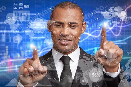 Preview: Pleased Young Businessman In Formal Wear Touches Futuristic Screen Interface, Studies Influz Of